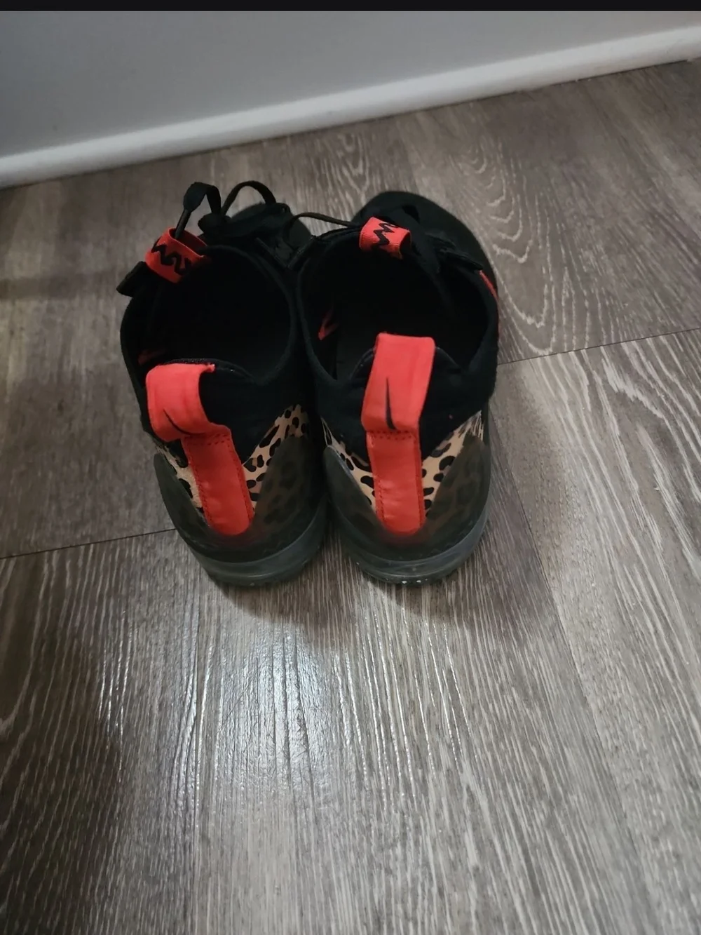 Nike Kids Black Sneakers with Red Accents